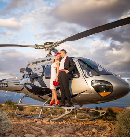 Romantic Grand Canyon & Valley of Fire helicopter wedding ceremony package includes a Private Wedding Coordinator, helicopter flight above and below the rim of the Grand Canyon, exclusive helicopter landing at the Valley of Fire State Park